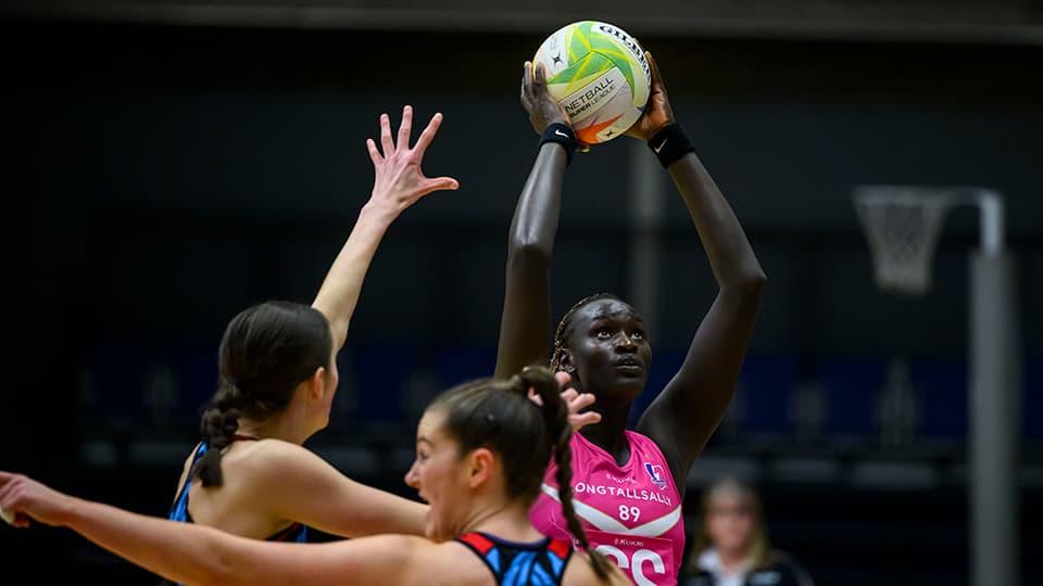 Mary Cholhok shooting at goal