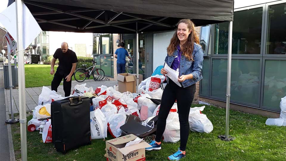 Pictured are bags of clothes donated by students. 