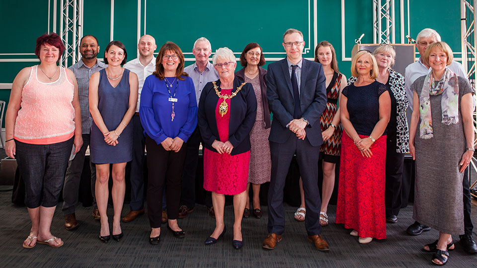 photo of Richard Taylor with the recipients of the Community Donations Fund funding