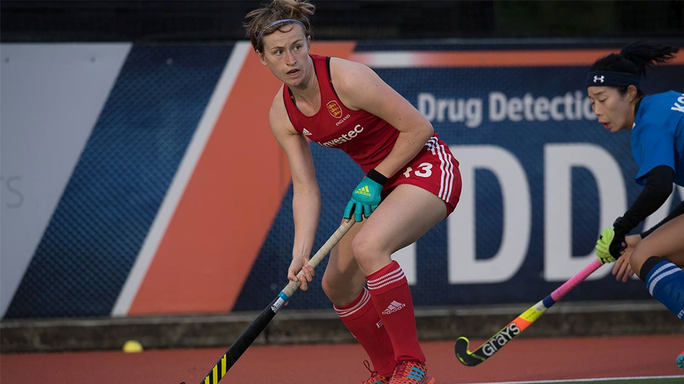 photo of Ellie Rayer, Loughborough student playing hockey 