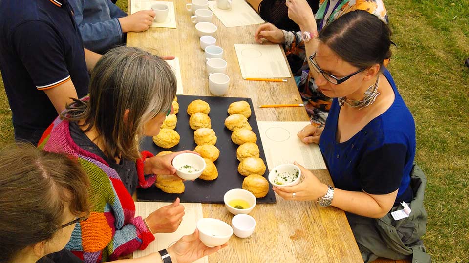 Pictured are people at the Fruit Routes summer event. 