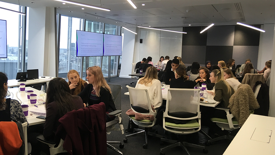 Photo of students taking part in a workshop at Jellyfish headquarters