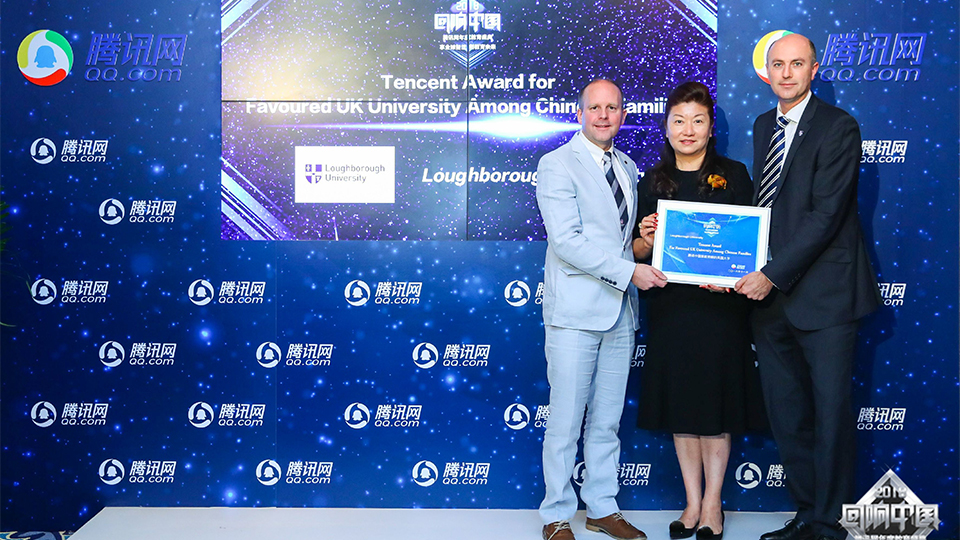 Charlie and Simon accepting the award on behalf of Loughborough University at the ceremony. 