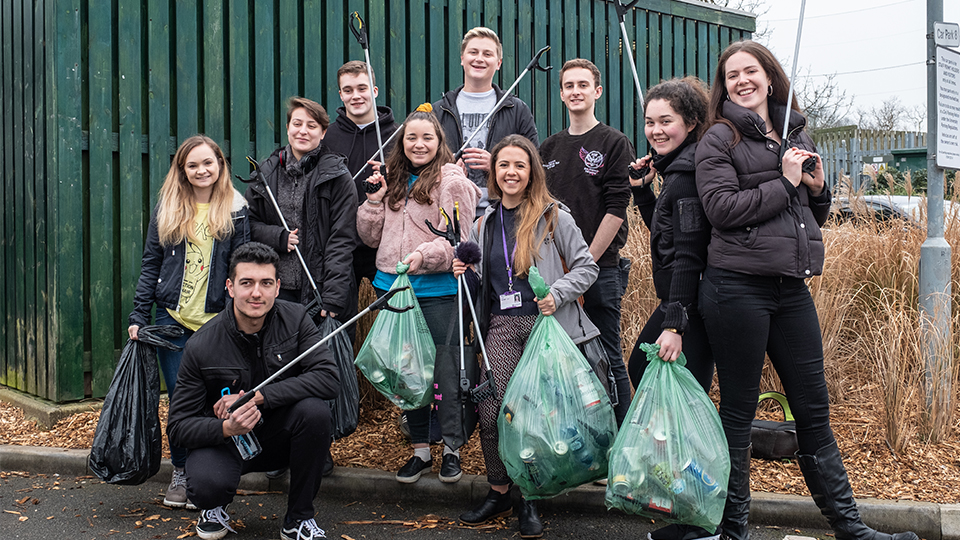 photo of students and LSU Exec staff with bags of litter picked up