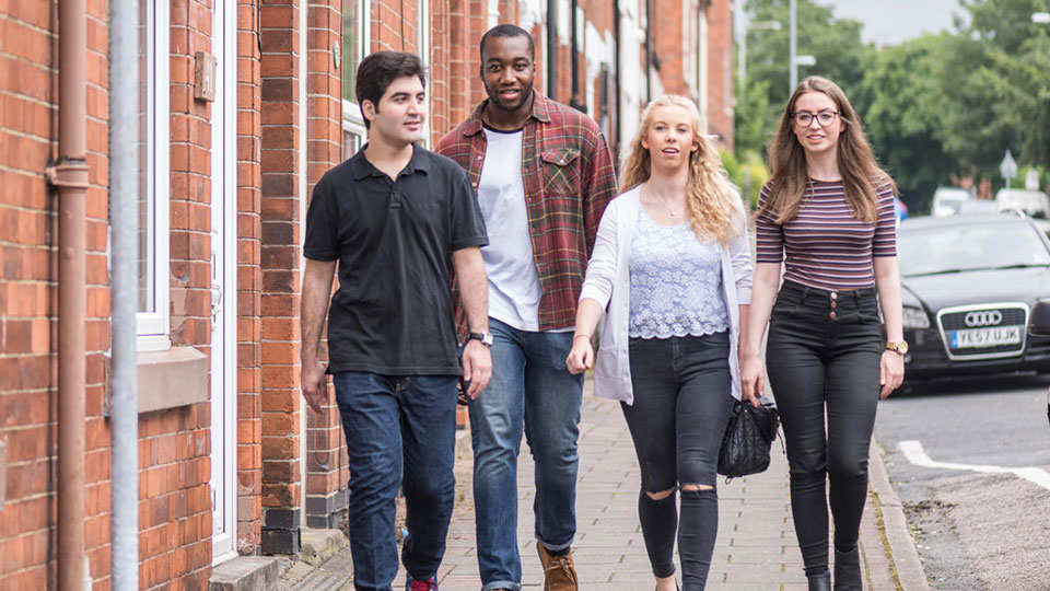 Students walking on street 