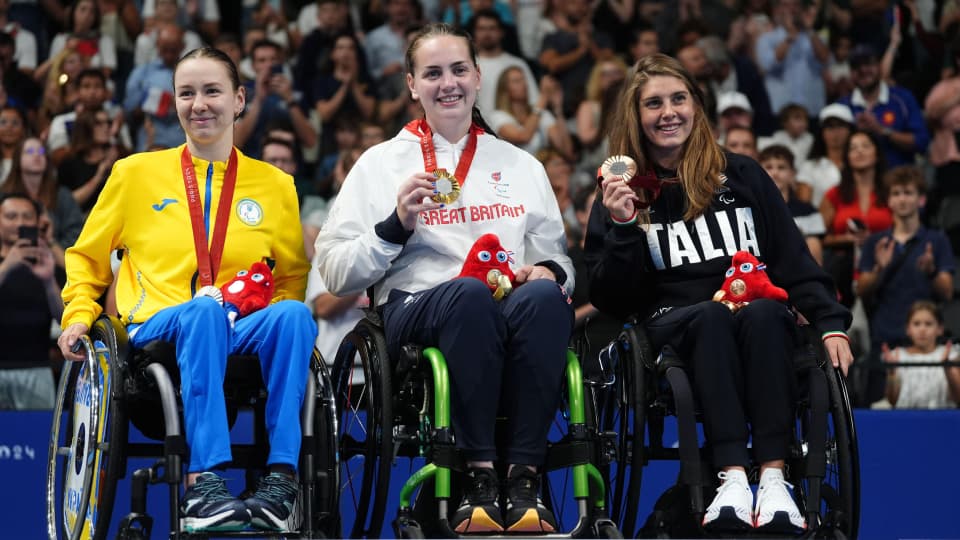 tully kearney collecting her gold medal at the paralympics