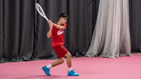 Tennis player Ben Gusic-Wan in training.