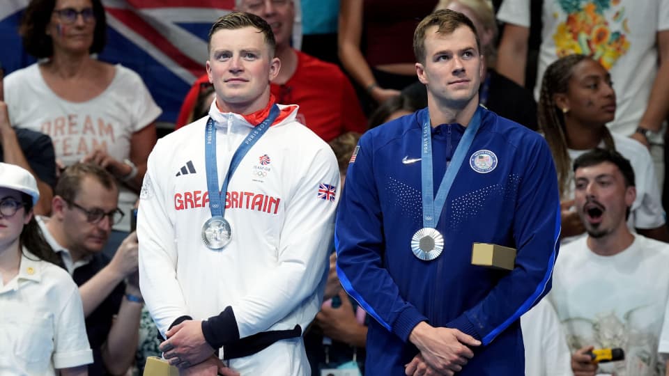 Adam Peaty on the podium in Paris with a silver medal