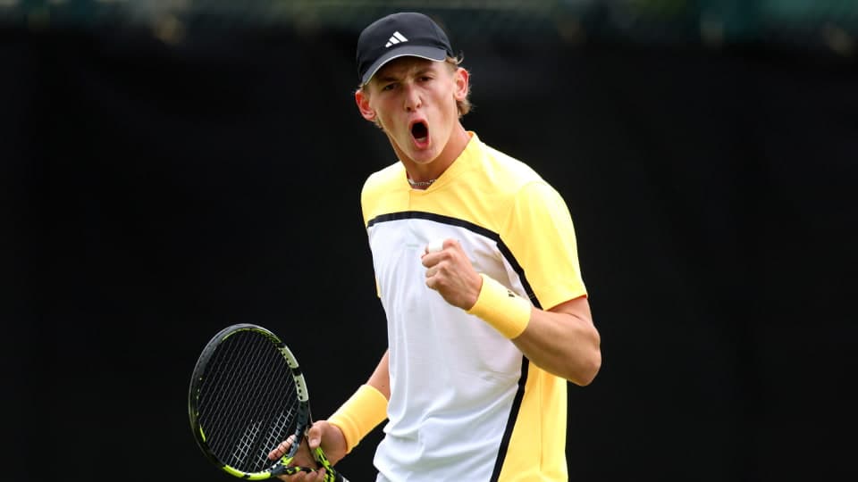 Henry Searle playing tennis