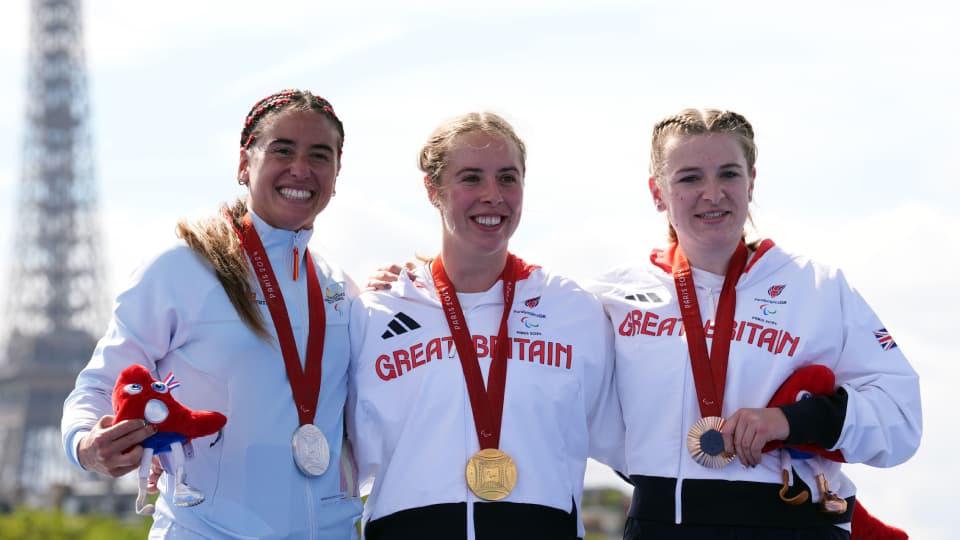 Great Britain's Megan Richter with her gold medal, Spain's Marta Frances Gomez with her silver medal and Great Britain's Hannah Moore with her bronze medal following the Women's PTS4 Para Triathlon at Pont Alexandre III on day five of the Paris 2024 Summer Paralympic Games