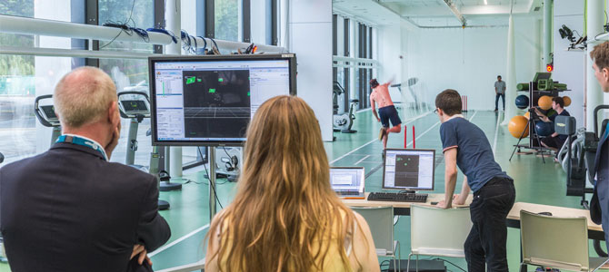 A view of an indoor cricket lab analysing a bowler's action.