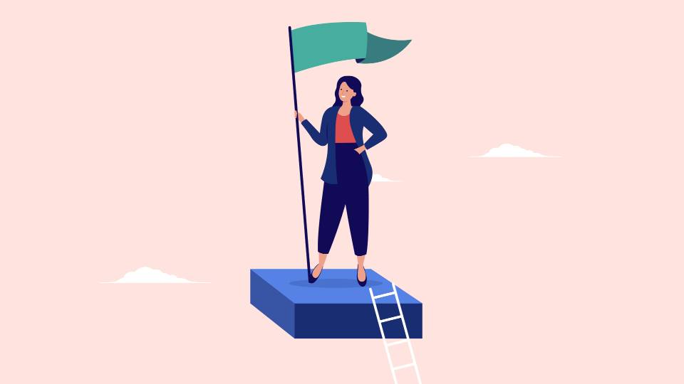 A woman holding a green flag stood on a platform with a ladder leading up to the platform